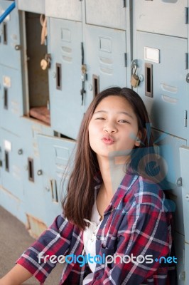 Asia Thai Teenager Women Scotch T-shirt Relax And Smile Stock Photo