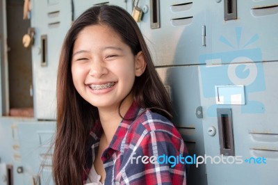 Asia Thai Teenager Women Scotch T-shirt Relax And Smile Stock Photo