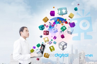 Asian Businessman With Technology Concept Stock Photo