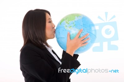 Asian Businesswoman With Globe Stock Photo