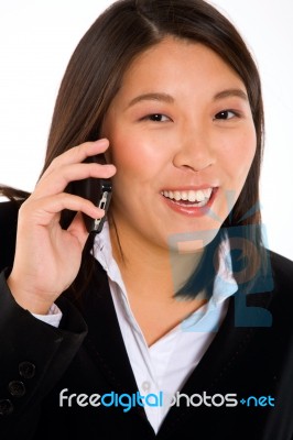 Asian Businesswoman With Mobile Stock Photo