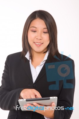 Asian Businesswoman With Tablet Stock Photo