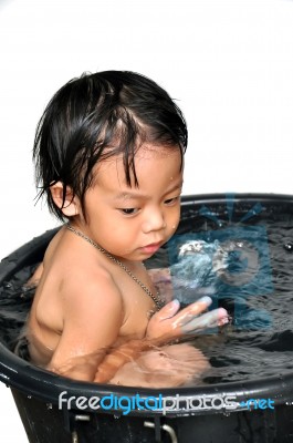 Asian Child Having Bathing Stock Photo