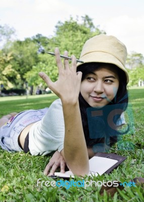 Asian College Student Studying Outdoor Stock Photo