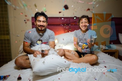 Asian Couple Celebrating New Year With Fire Cracker Stock Photo