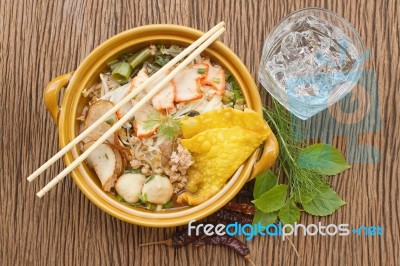 Asian Cuisine , Pork Noodle In The Bowl With Herb Stock Photo