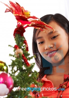 Asian Girl Enjoying Christmas Stock Photo