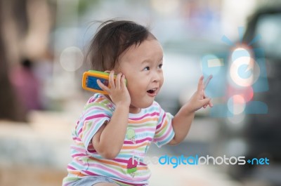 Asian Girl With Cute Action Stock Photo