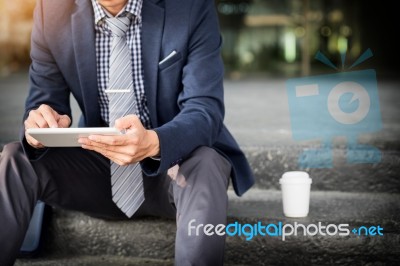 Asian Indian Businessman Using Tablet Pc Outdoors, Golden Sunlig… Stock Photo