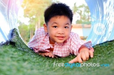 Asian Kid Playing Stock Photo