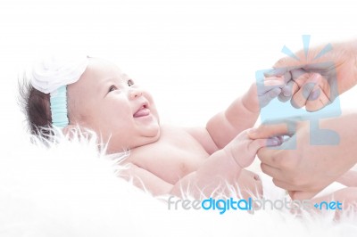 Asian Laughing Baby Stock Photo