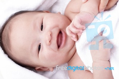 Asian Laughing Baby Stock Photo