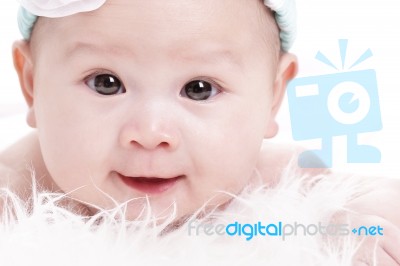 Asian Laughing Baby Stock Photo