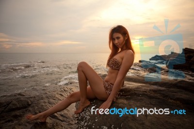 Asian Model Posing On Sunset Stock Photo