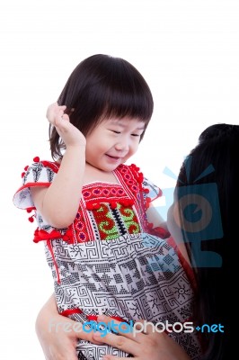 Asian Mother Playing Her Adorable Little Daughter, On White. Stu… Stock Photo