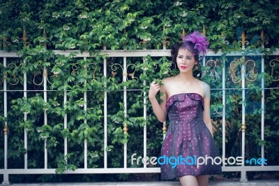 Asian Retro Women Fashion With Purple Suit Stock Photo