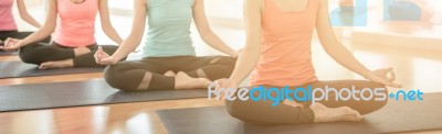 Asian Woman Doing Yoga Indoors Stock Photo