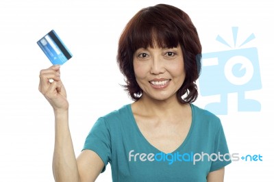 Asian Woman Holding Credit Card Stock Photo