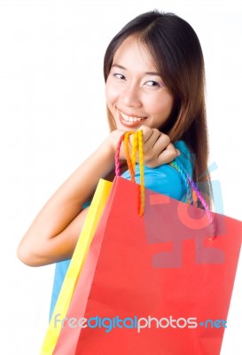 Asian Woman Holding Shopping Bag Stock Photo