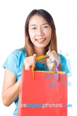 Asian Woman Holding Shopping Bag Stock Photo