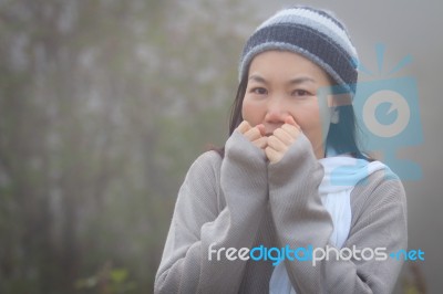 Asian Woman In Fog Stock Photo