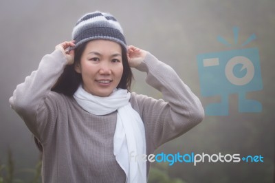 Asian Woman In Fog Stock Photo