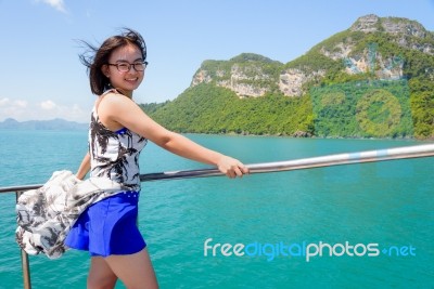 Asian Woman On The Boat Stock Photo