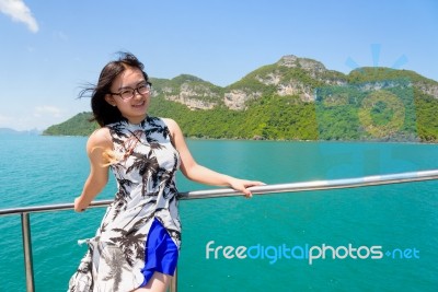 Asian Woman On The Boat Stock Photo