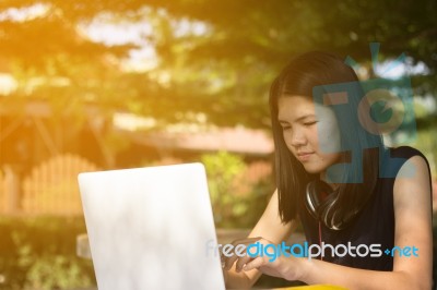 Asian Woman Or Student Using Laptop  Stock Photo