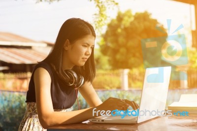 Asian Woman Or Student Using Laptop  Stock Photo