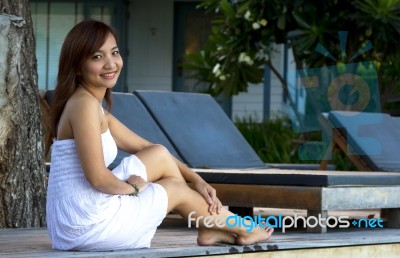 Asian Woman Portrait Relax Sitting At The Garden Stock Photo