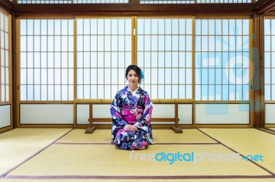 Asian Woman Wearing Japanese Traditional Kimono In Japan Stock Photo