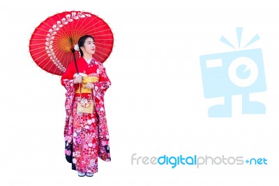 Asian Woman Wearing Japanese Traditional Kimono On White Background Stock Photo