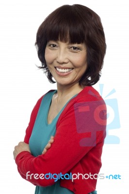 Asian Woman With Arms Crossed Stock Photo