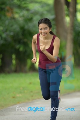 Asian Women Are Jogging Stock Photo