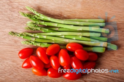 Asparagus And Tomato Stock Photo