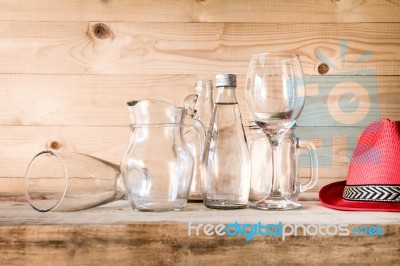 Assorted Glass Bottles On A White Washed Wooden Table. Clear Gla… Stock Photo