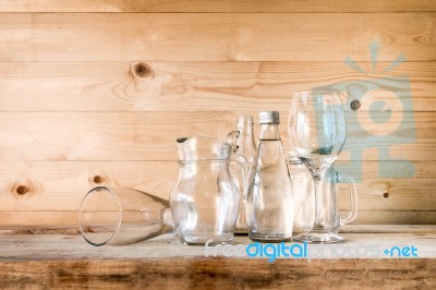 Assorted Glass Bottles On A White Washed Wooden Table. Clear Gla… Stock Photo