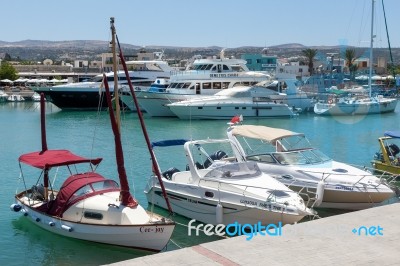 Assortment Of Boats In The Harbour At Latchi Stock Photo