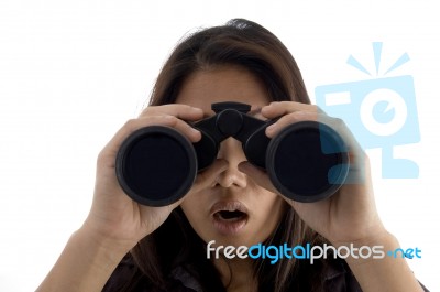 Astonished Female Watching Through Binocular Stock Photo