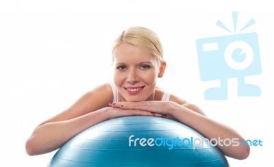 Athlete Lady Resting Chin Over Ball Stock Photo