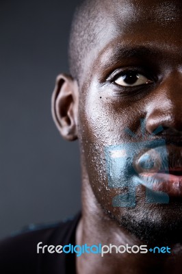 Athletic Man Running In Black Background Stock Photo