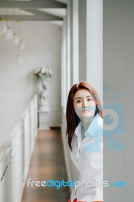 Attractive Asian Girl Portrait With Window Light Stock Photo