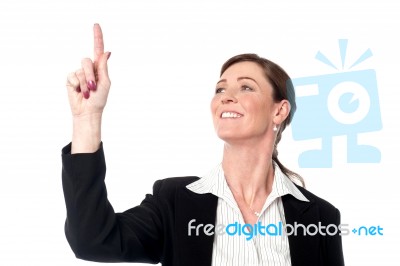 Attractive Business Lady Pointing Stock Photo