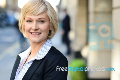 Attractive Business Lady Posing Outdoors Stock Photo