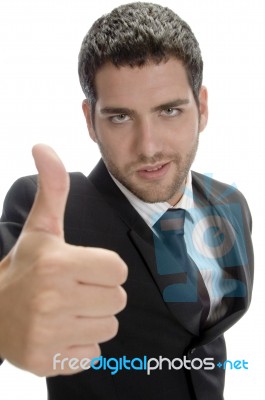 Attractive Businessman Showing Thumbs Up Stock Photo