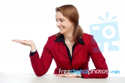 Attractive Businesswoman Presenting Copy Space Stock Photo