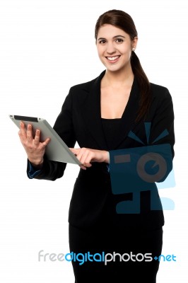 Attractive Businesswoman Working On Touch Pad Stock Photo