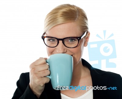 Attractive Corporate Female Drinking Coffee Stock Photo