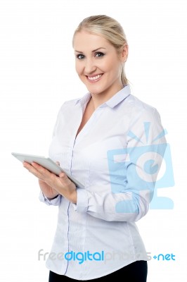 Attractive Corporate Lady With Touch Pad Stock Photo